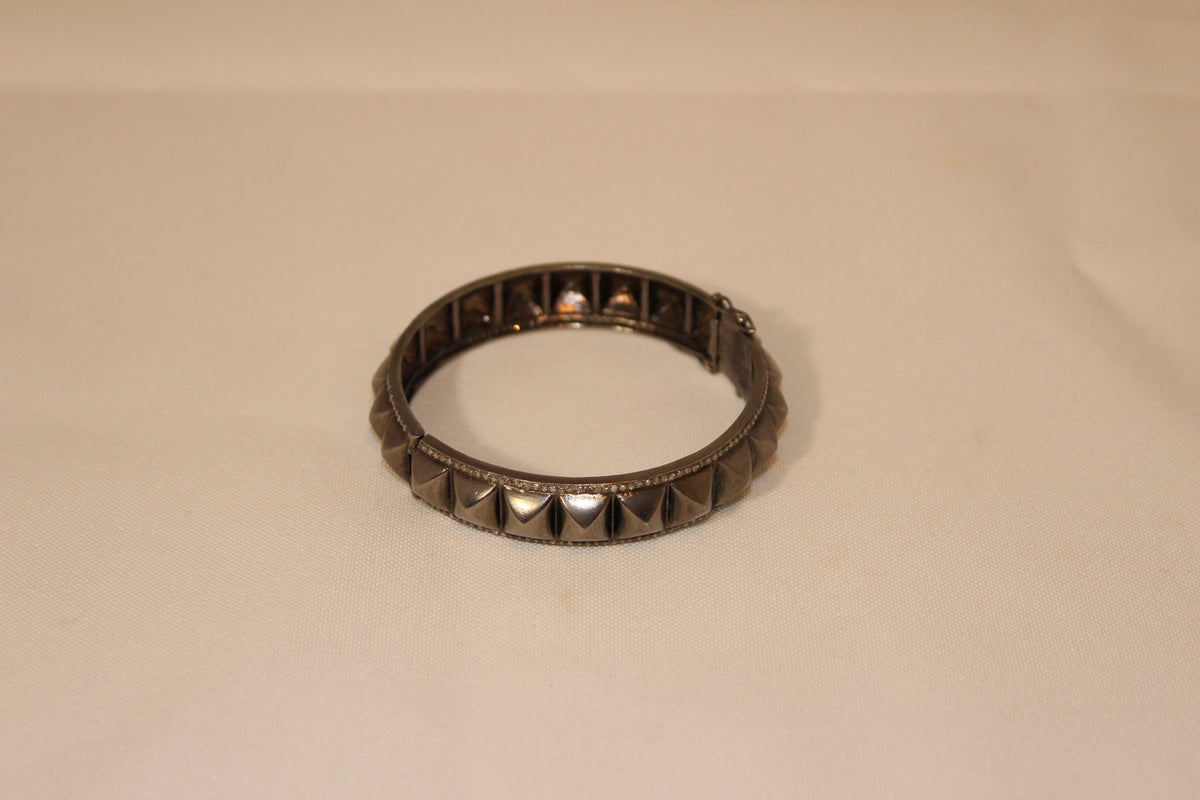 Spike Bangle - thegreatputonmvSpike BangleSpike BangleSpike BangleBraceletGristhegreatputonmvB180Spike bangle with pave diamond edge and oxidized sterling silver One size Sourced from India31269255