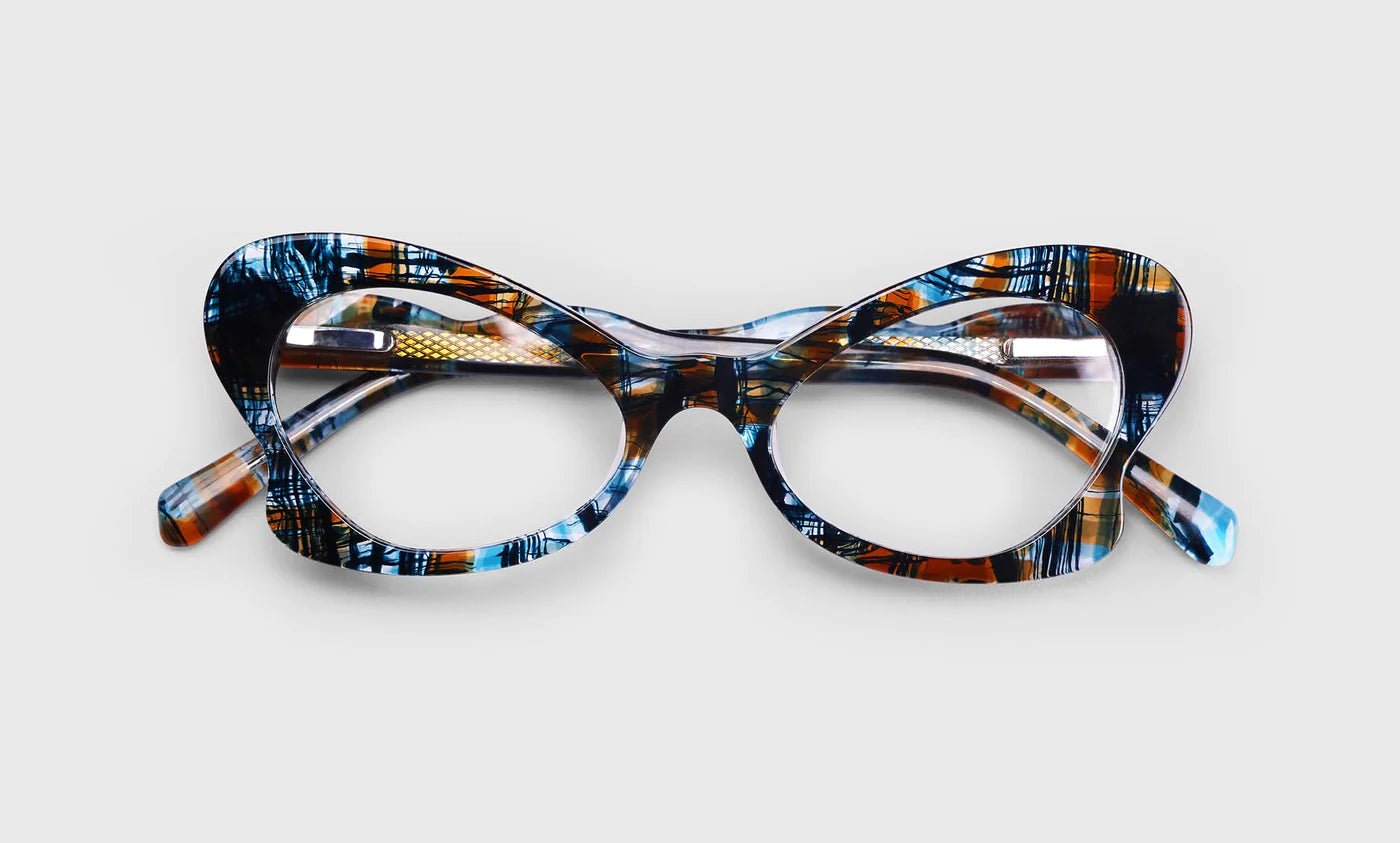 Wing It - thegreatputonmvWing ItWing ItWing ItGlassesEyebobsthegreatputonmv3436-59Wing It59 - Teal and Brown Pattern Front and Temples1.50