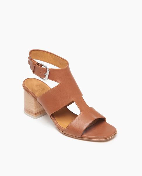 A substantial and secure t-strap offers the Berry sandal a modern streamlined look atop our newest tonal wood-inlay heel. In a soft, vegetable-tanned cuoio leather. Large buckle closure.