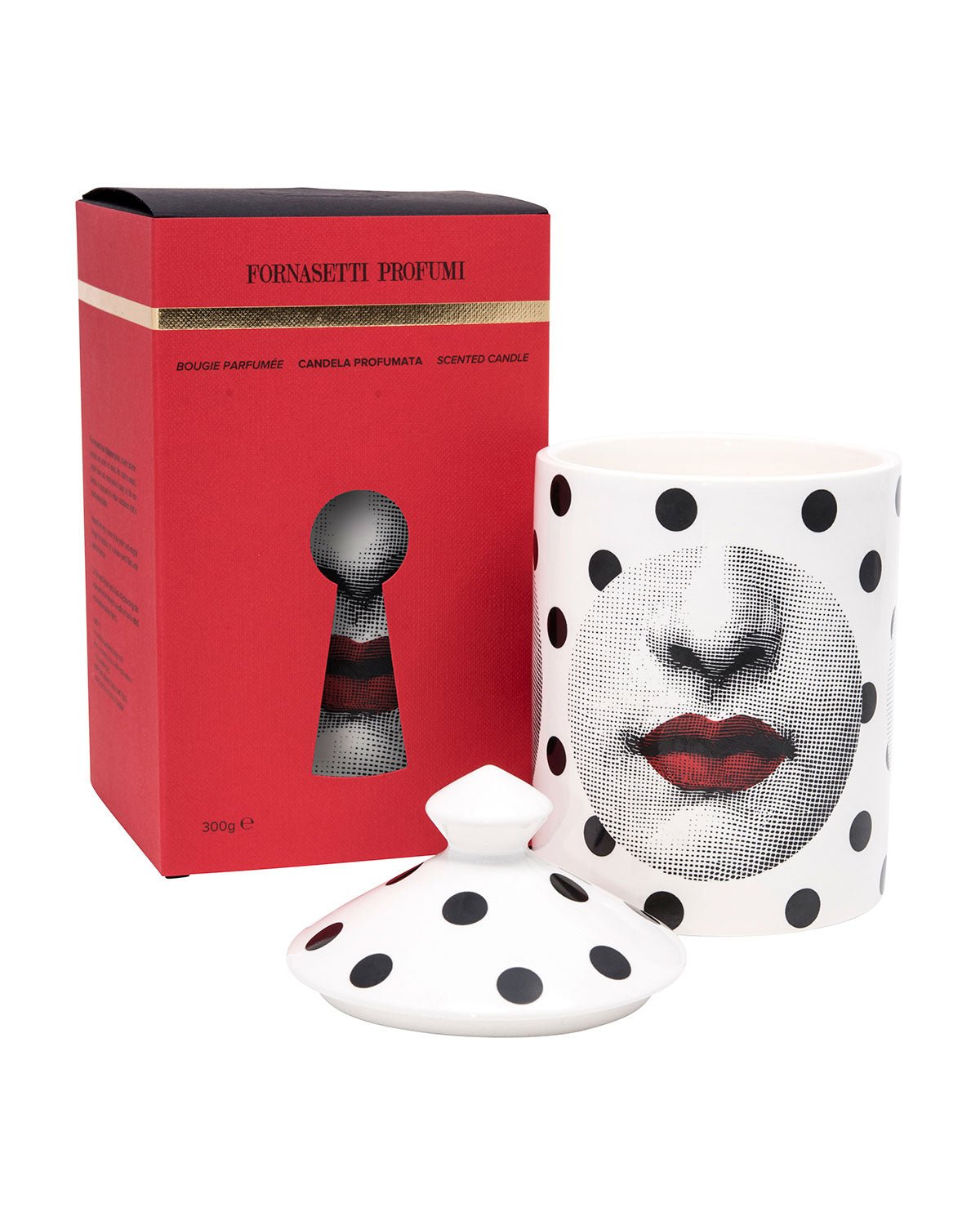 Comme De Forna - thegreatputonmvComme De FornaComme De FornaComme De FornaCandleFornasettithegreatputonmvIn a clear expression of the unmistakable irony that typifies the Fornasetti style, red lips intensify the hypnotic power of geometric repetition. A charismatic symbol of vitality and passion, they add an irreverent touch to the strict alternation of black and white in the abstract composition. "Otto", the signature scent of the Fornasetti Profumi collection is sophisticated and unique; trans