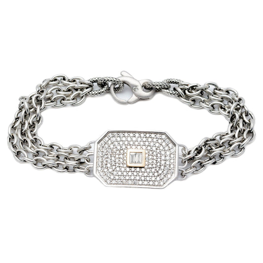 Avalon Pave Bracelet - thegreatputonmvAvalon Pave BraceletAvalon Pave BraceletAvalon Pave BraceletBraceletLizabeththegreatputonmvLGB362 - DThis triple - strand bracelet features a satin - finish, sterling silver, chamfered rectangle covered in diamond pavé and accented by two baguette diamonds bezel - set in 14K yellow gold in the center on our exclusive steel chain. Includes a Liza Beth signature satin finish diamond clasp Dimensions of rectangle: 25 mm x 18 mm Total diamond carat weight: 1.47 