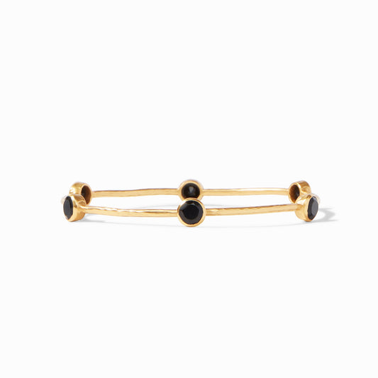 Milano Bangle - thegreatputonmvMilano BangleMilano BangleMilano BangleBraceletJulie VosthegreatputonmvBG047GBOA lightly hammered bangle features six circular gemstones that sit along the length of this slim bangle, making it perfect for mixing and matching to create a striking color story on your wrist.Obsidian BlackMedium70188423