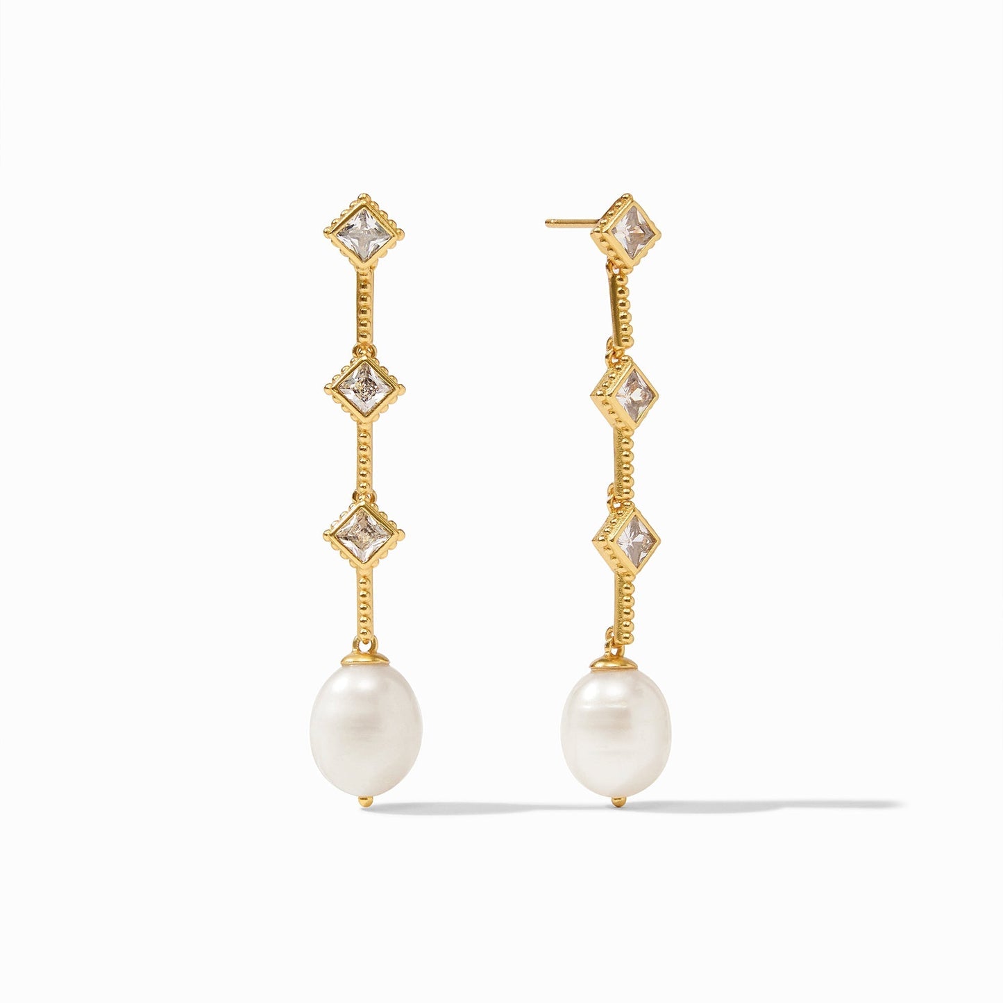 Noel Pearl Statement Earring - thegreatputonmvNoel Pearl Statement EarringNoel Pearl Statement EarringNoel Pearl Statement EarringEarringsJulie VosthegreatputonmvER823GCZ00A lustrous freshwater pearl dangles beneath three diamond - shaped brilliant cut CZ gemstones linked with golden bars embellished with beaded details.GoldOS74183303