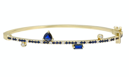 Sapphire Bangle - thegreatputonmvSapphire BangleSapphire BangleSapphire BangleBraceletHarikathegreatputonmvHB51Blue sapphire and 14k yellow gold bangle with double clasp Blue sapphire: .57CT White diamonds: .16CT Blue sapphire trillion: .42CT Blue sapphire baguette: .16CT Made in Turkey78535815
