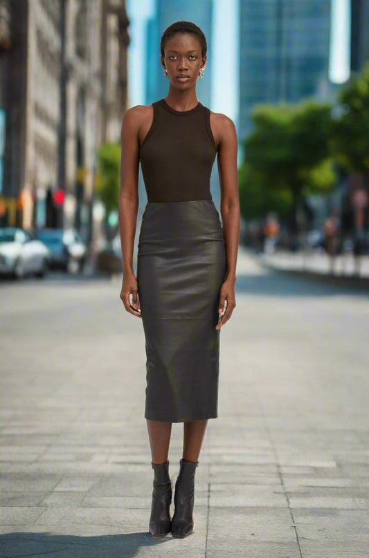 Tube Skirt - thegreatputonmvTube SkirtTube SkirtTube SkirtSkirtSPRWMNthegreatputonmvDiscover the perfect blend of elegance and versatility with our stunning Tube Skirt, meticulously crafted from 100% premium leather. This chic piece promises to become a staple in your closet, ready to enhance any outfit. BlackXS