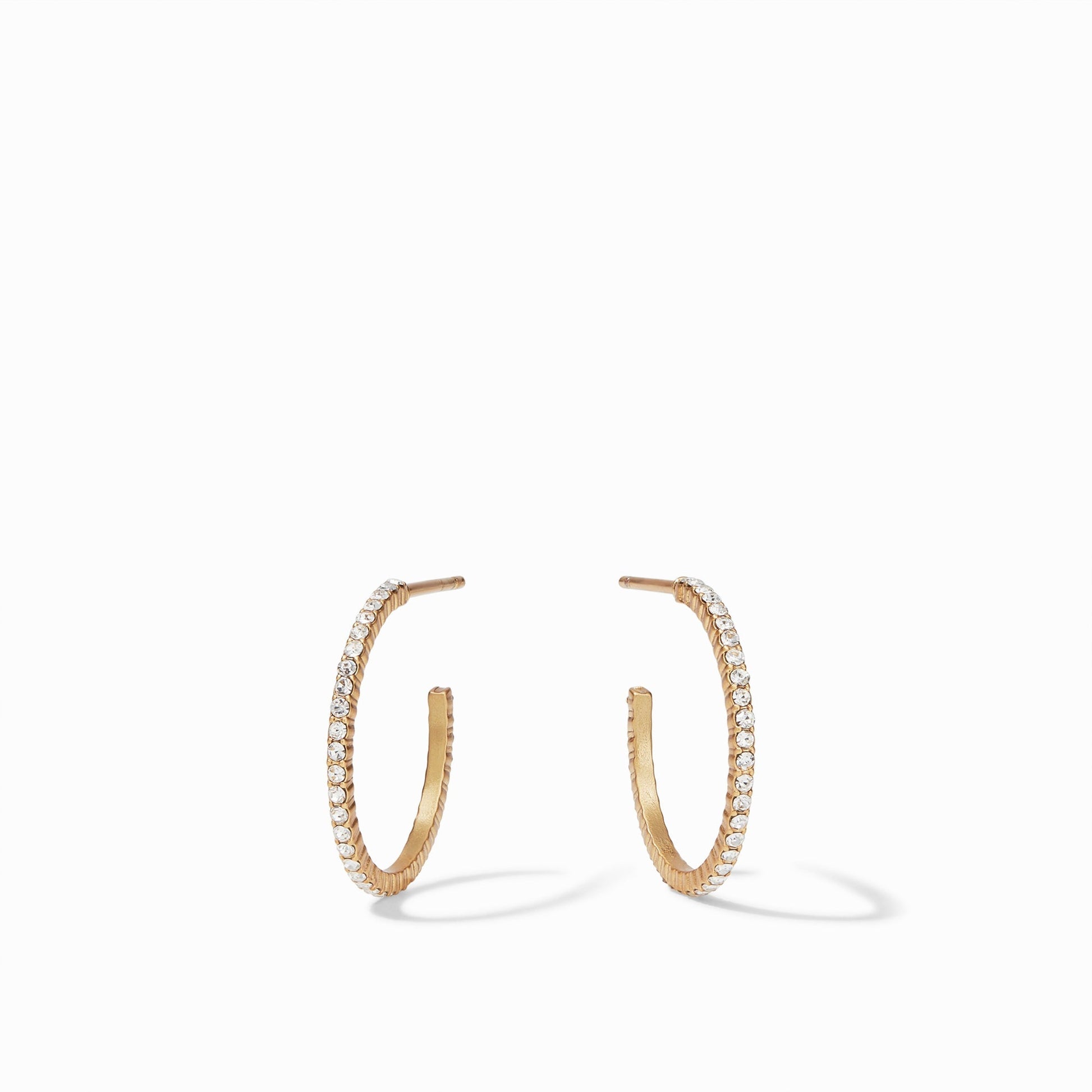 Windsor Hoop - thegreatputonmvWindsor HoopWindsor HoopWindsor HoopEarringsJulie VosthegreatputonmvHP059GCC - SSparkle and shine in a pair of striking CZ hoop earrings adorned with pavé CZ. These slender, thin hoops are available in four different sizes.GoldSmall70271879