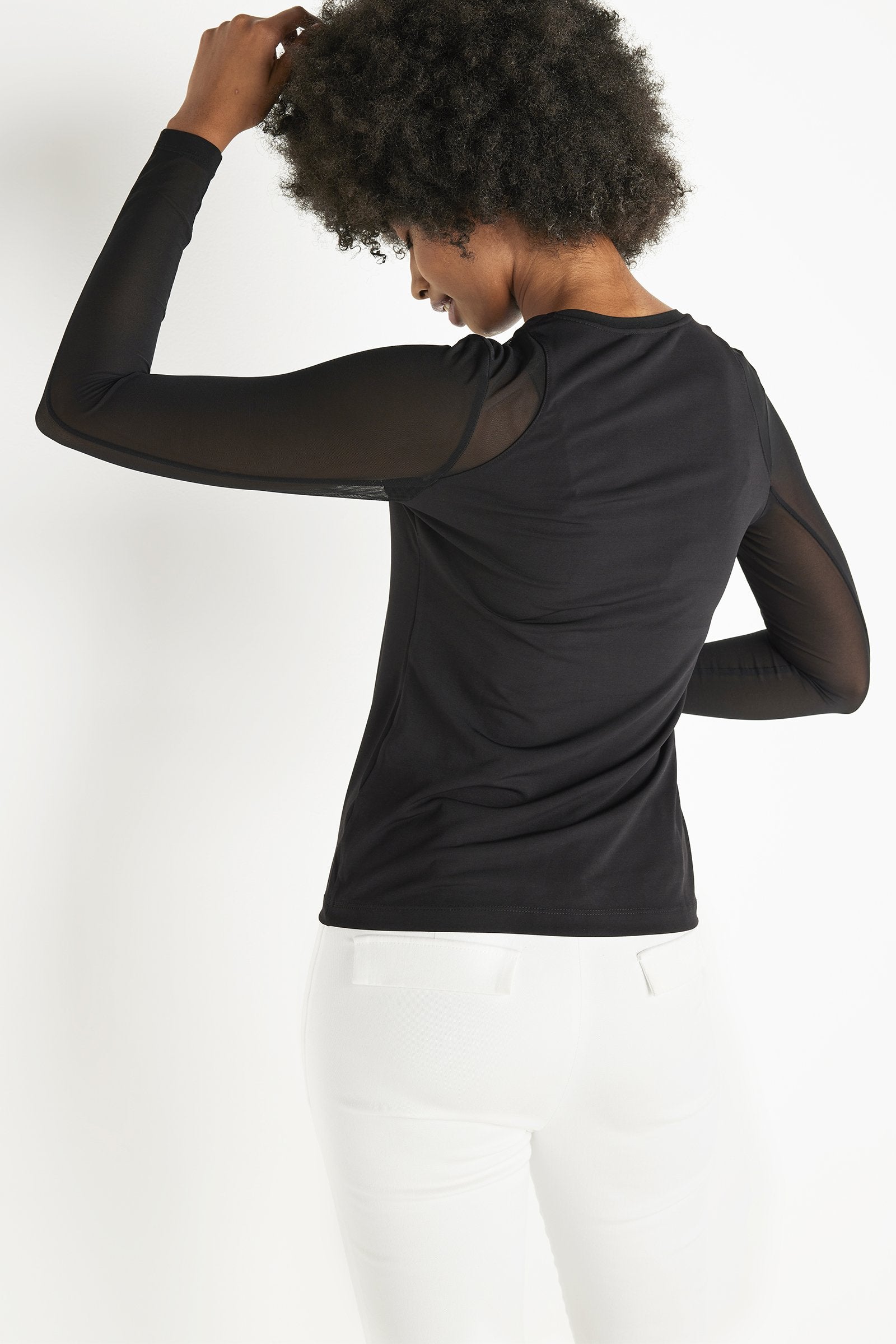 Meet Isla: our newest sillouette stylish member, truly a must-have lightweight long-sleeve top crafted in super soft stretch jersey and power mesh  blend with elegant signature stretch power mesh sleeves and front and back panels. A sleek silhouette and V-neck front with mesh overlay make it a modern wardrobe essential for travel and everyday. 