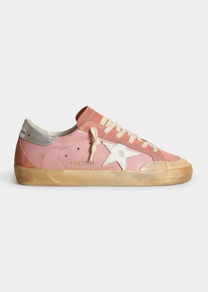 Golden Goose Super Star Mixed Leather Sneaker in Pale Pink - thegreatputonmvGolden Goose Super Star Mixed Leather Sneaker in Pale PinkGolden Goose Super Star Mixed Leather Sneaker in Pale PinkGolden Goose Super Star Mixed Leather Sneaker in Pale PinkSneakerGolden Goosethegreatputonmv111395Golden Goose low-top sneakers in suede with matte and metallic leather. Signature contrast star at side. 1" flat heel. Round toe. Lace-up vamp. Logo at tongue. Cushioned footbed. Breathable leather/cotton linin